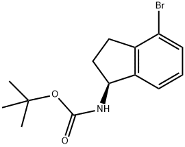 Carbamic acid, N-[(1S)-4-bromo-2,3-dihydro-1H-inden-1-yl]-, 1,1-dimethylethyl ester Structure