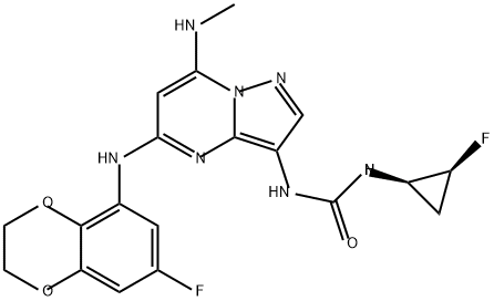 Urea, N-[(1R,2S)-2-fluorocyclopropyl]-N'-[5-[(7-fluoro-2,3-dihydro-1,4-benzodioxin-5-yl)amino]-7-(methylamino)pyrazolo[1,5-a]pyrimidin-3-yl]- Structure